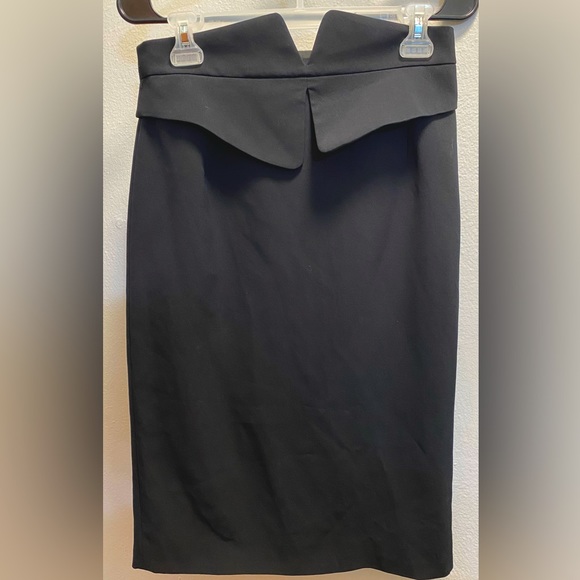 Black Gucci pencil skirt with high waisted notched waistband. Size 4 US 40 IT.